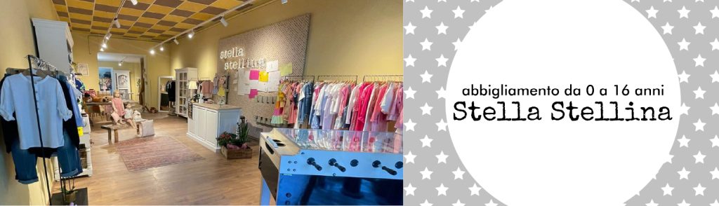 Interno del negozio Stella Stellina con abbigliamento per bambini e adolescenti da 0 a 16 anni