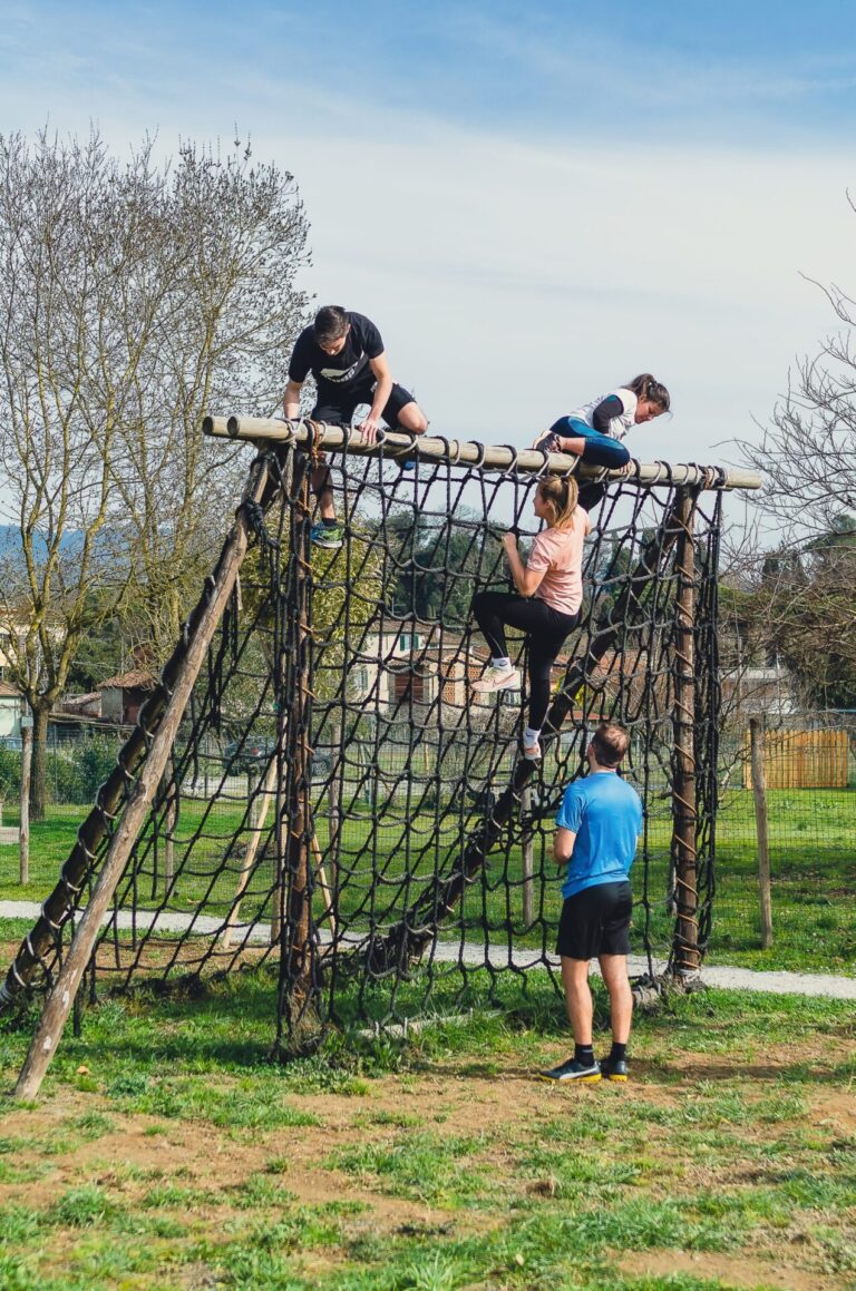 Outdoor fitness course with climbing wall and group functional training at EGO Wellness